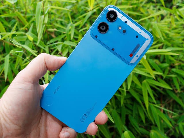 Nothing Phone 4b with 120Hz AMOLED display in a realistic lifestyle setting.